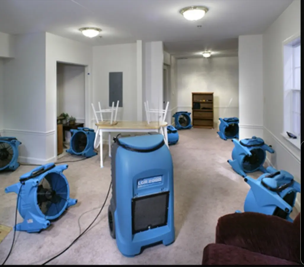Air movers and dehumidifier setup for Water Damage Restoration in Chester